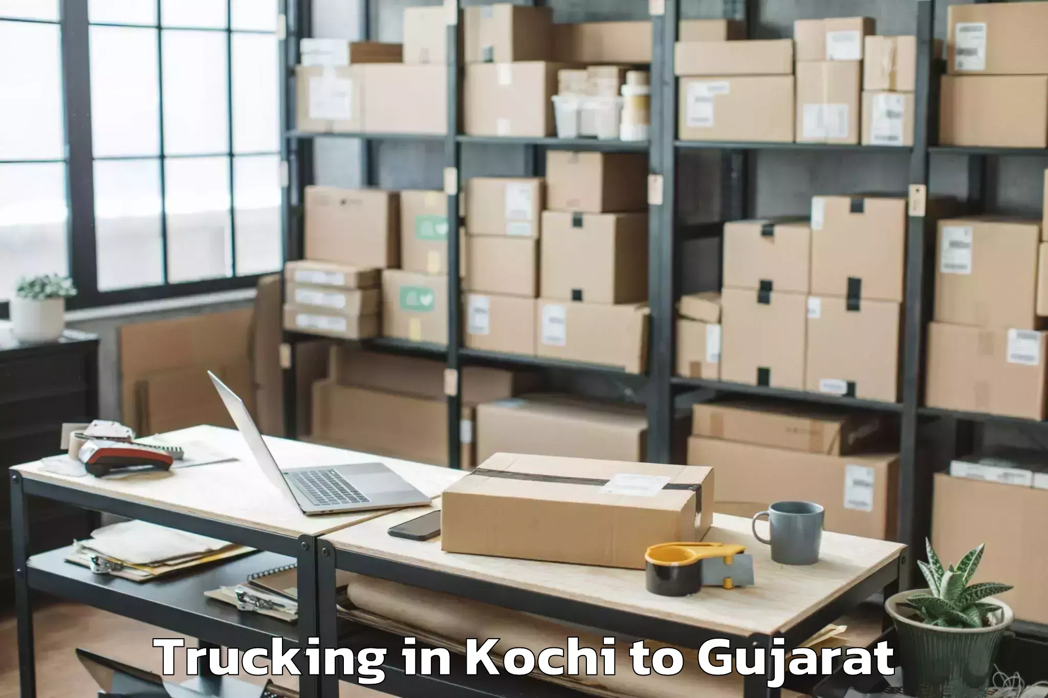 Book Kochi to Netrang Trucking Online